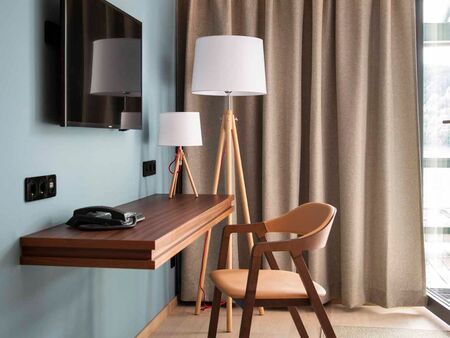Chair with desk against the wall