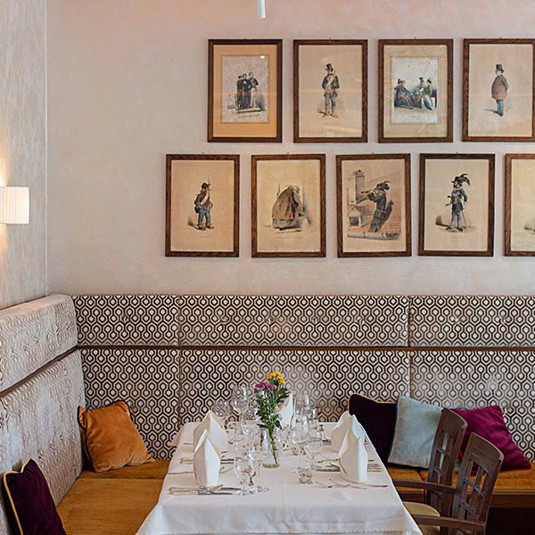 Covered table with couch in a restaurant