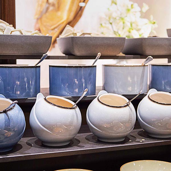 Blue and white keys are ready at the breakfast buffet with cereals