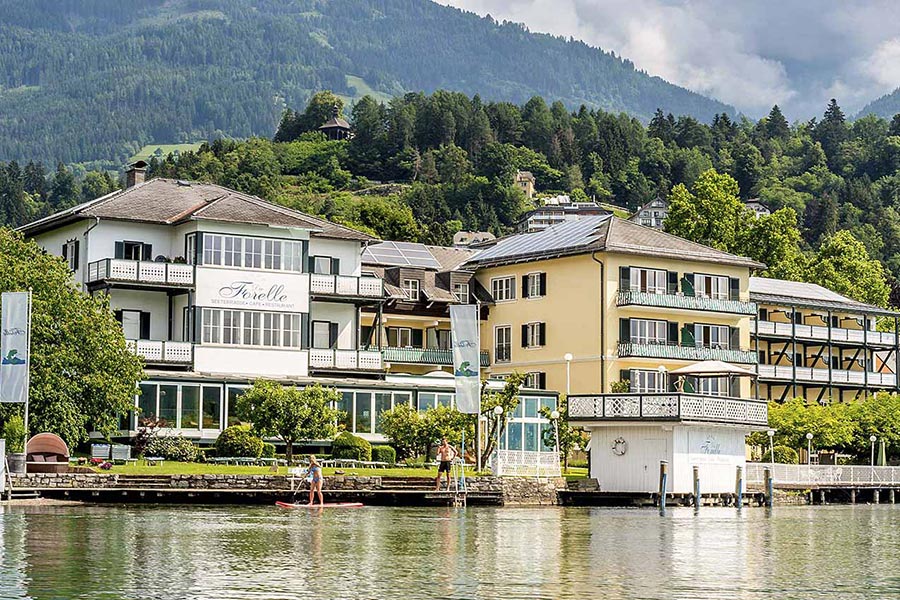 The Hotel Forelle in full view next to the lake.